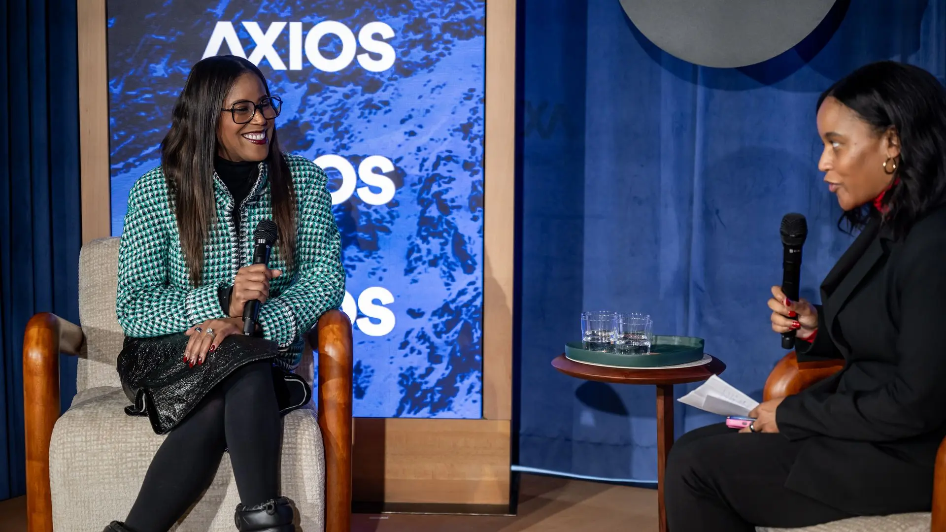 TIAA's Thasunda Brown Duckett appears onstage with Axios' Courtenay Brown at Axios House in Davos.