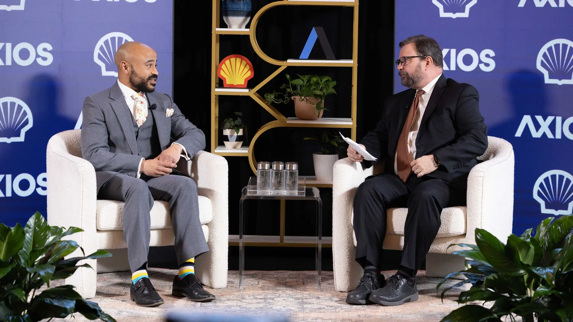 Southern Environmental Law Center staff attorney Josephus Allmond speaks to Axios energy and climate editor Chuck McCutcheon on stage at an Axios event.